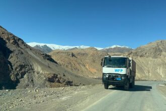 Instability, war and closed borders: How aid workers get emergency food to hungry Afghan children