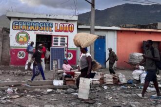 Guns, fashionable clothes and death threats: How gangs in Haiti ensnare children