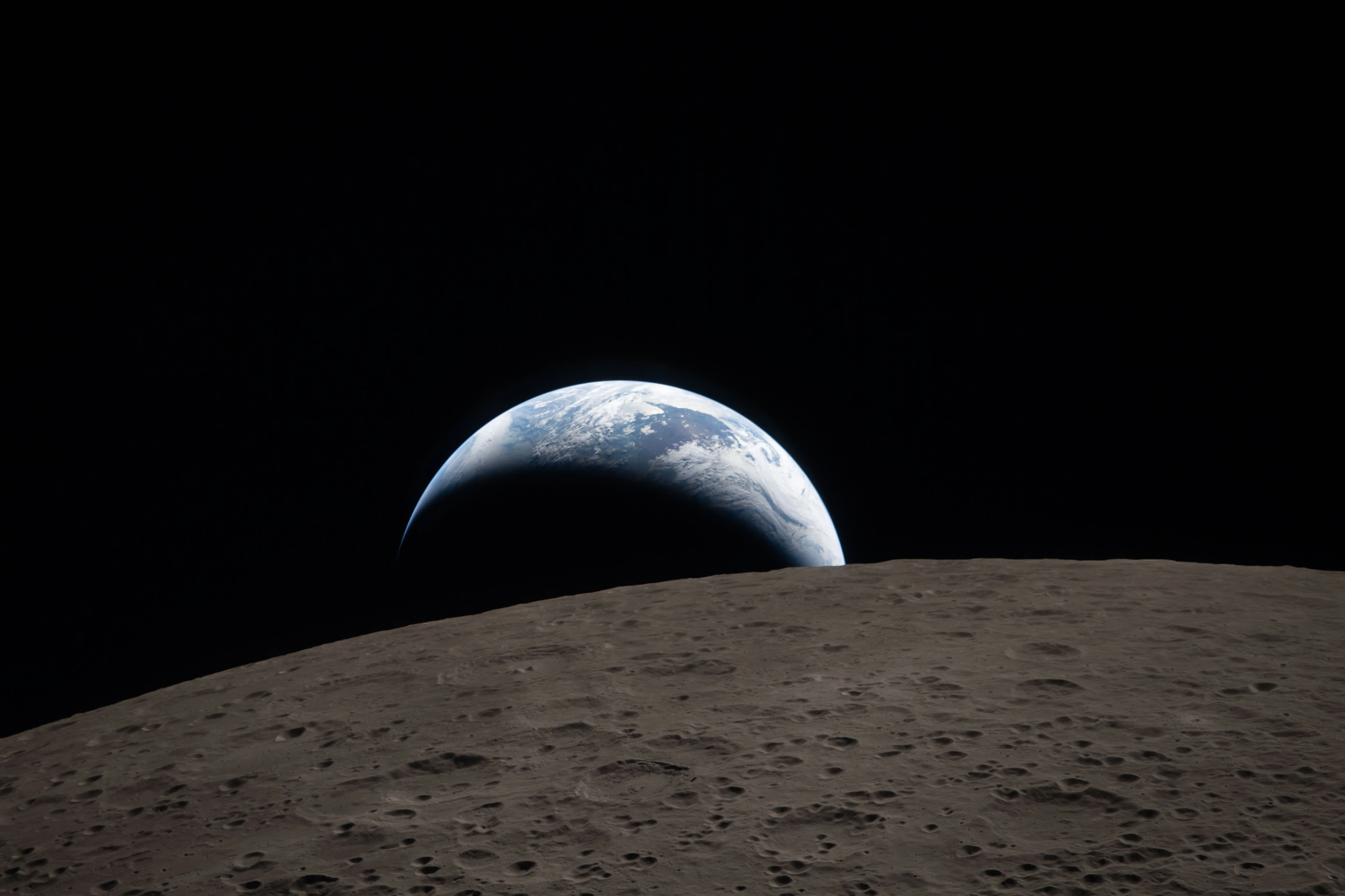 Earthset captured through Orion spacecraft window