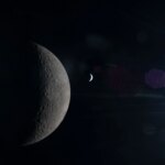 This image, taken from behind the Moon, shows its half-illuminated surface in sharp detail. To the right, a much smaller crescent Earth can be seen, with shades of blue and white just barely distinguishable. A faint reflection of the Orion spacecraft's window overlays the scene, especially in its right half.